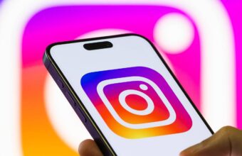 Instagram logo displayed on a smartphone.