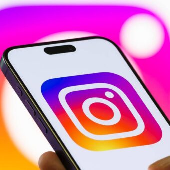 Instagram logo displayed on a smartphone.