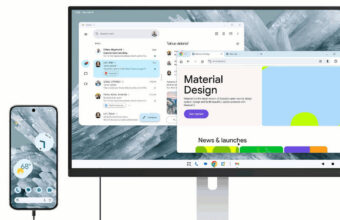Connected Android smartphone to a monitor displaying desktop applications.